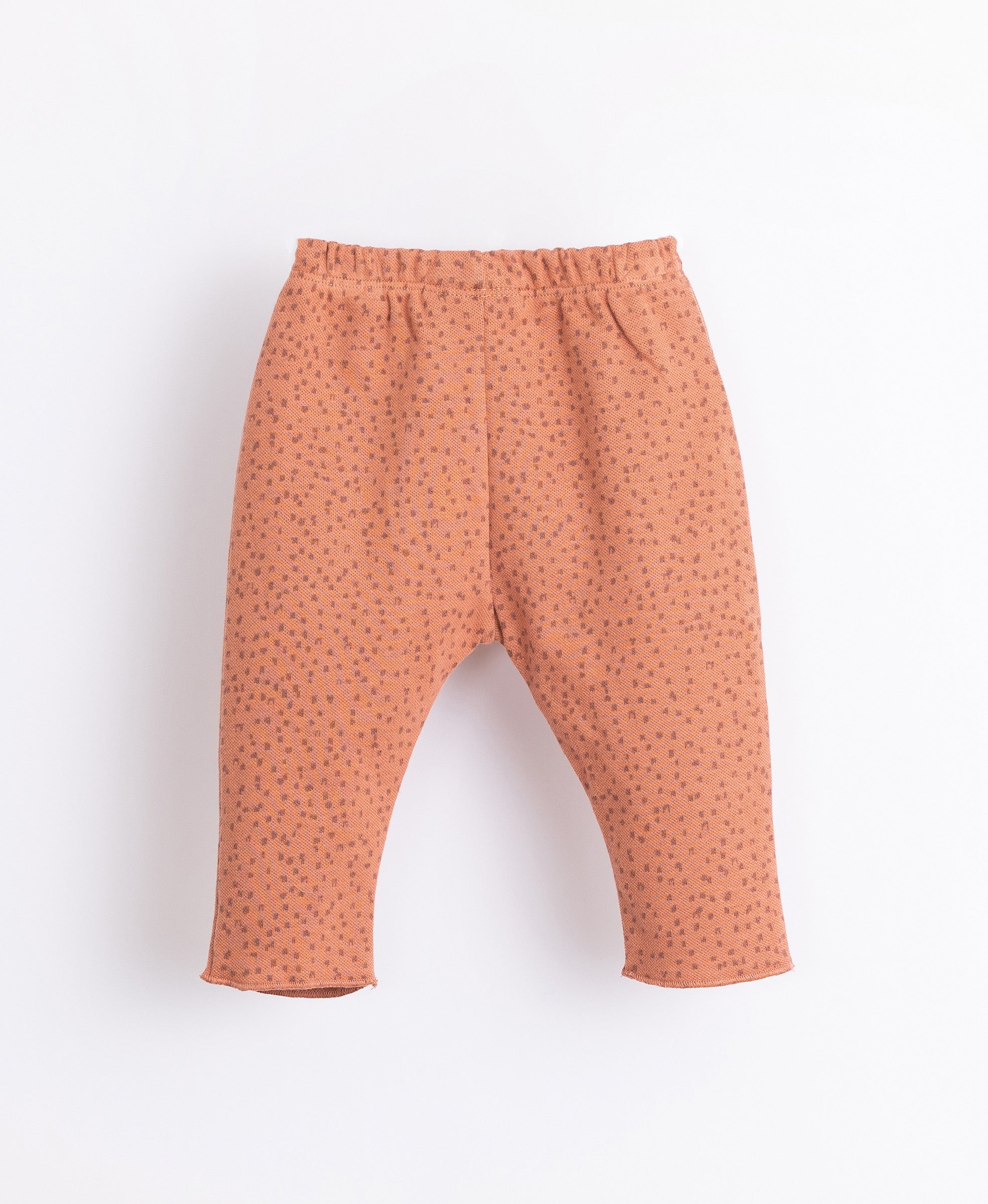 Pants with pattern and decorative buttons